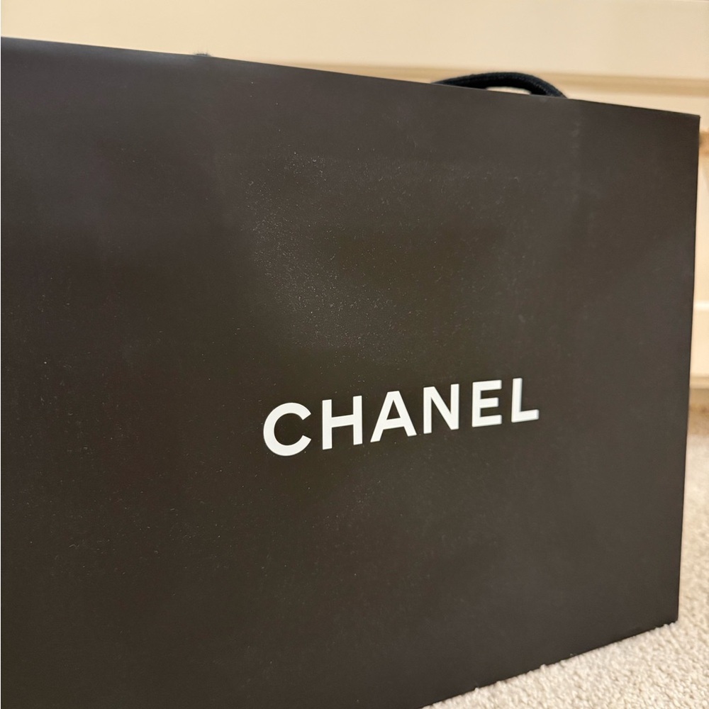 CHANEL Black Paper Bag with White Floral Detail - Picture 6 of 6